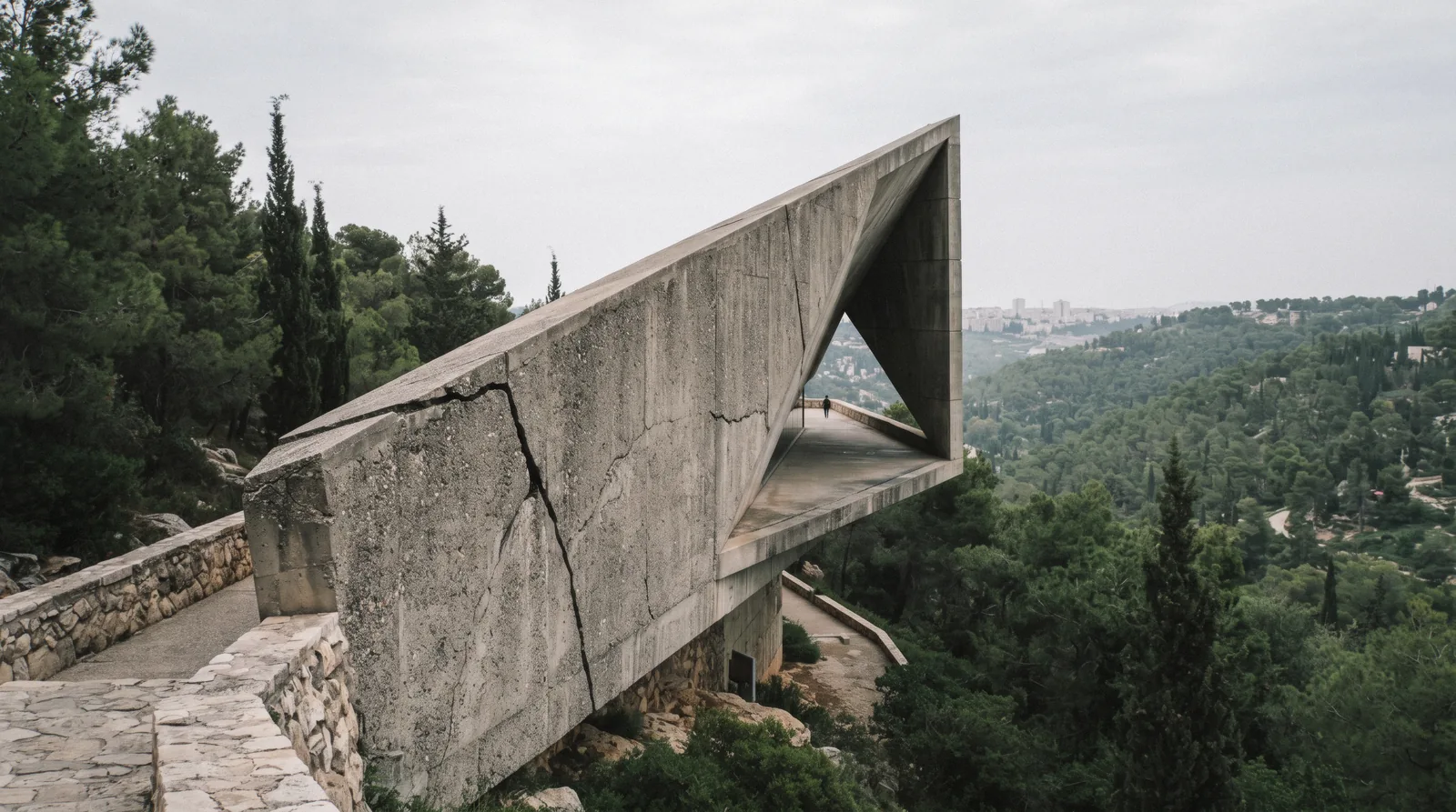 The exterior of the triangular concrete prism of the Holocaust History Museum at Yad Vashem on the Mount of Remembrance in Jerusalem at 10:00, yad vashem
